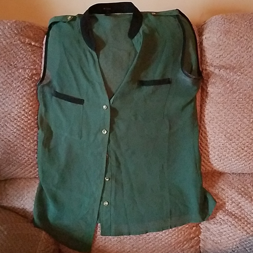 Sheer sleeveless button down blouse.